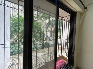 Balcony in 2 BHK Apartment at Raunak Unnathi Woods Phase 3, Ghodbunder Road – for Rent