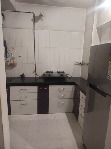 Kitchen in 2 BHK Apartment at Unnathi Woods Phase 3, Ghodbunder Road – for Rent