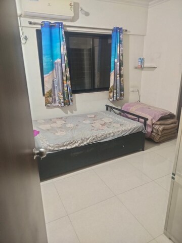 Bedroom in 2 BHK Apartment at Unnathi Woods Phase 3, Ghodbunder Road – for Rent