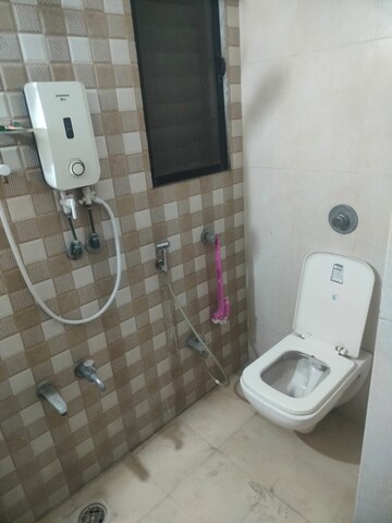 Bathroom in 2 BHK Apartment at Unnathi Woods Phase 3, Ghodbunder Road – for Rent