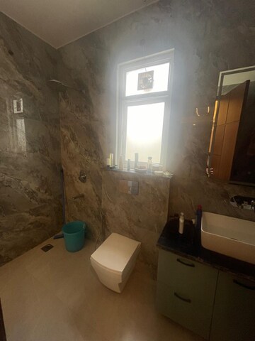 Bathroom in 4 BHK Builder Floor at Ansal API Esencia, Sector 67 – for Rent