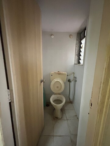 Bathroom in 1 BHK Apartment at Unnathi Woods Phase 1 And 2, Ghodbunder Road – for Sale