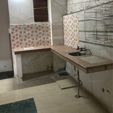 Kitchen in 1 RK Independent House at RWA Apartments Sector 50, Sector 50 – for Rent