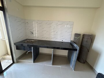 Kitchen in 2 BHK Apartment at Pushpanjali Heights, Owale – for Sale