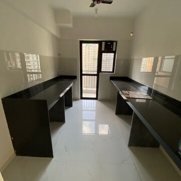 Kitchen in 3 BHK Apartment at Runwal Gardens Phase 2, Kalyan Shilphata Road – for Rent