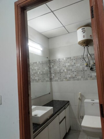Bathroom in 1 BHK Apartment at Paramount Golfforeste, Zeta I Greater Noida – for Rent