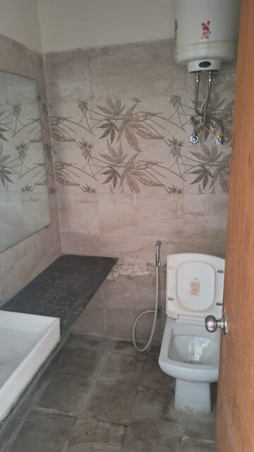 Bathroom in 1 BHK Apartment at Paramount Golfforeste, Zeta I Greater Noida – for Rent