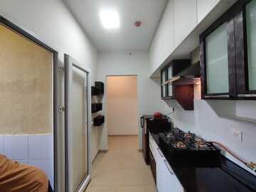 Kitchen in 2 BHK Apartment at Bhartiya City Nikoo Homes II, Thanisandra Main Road – for Rent