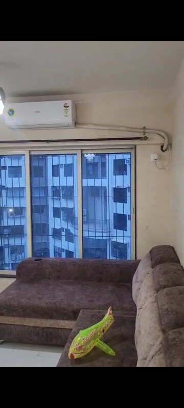 Living Room in 1 BHK Apartment at Gsa Grandeur, Malad East – for Rent