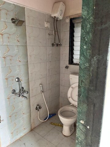 Bathroom in 2 BHK Apartment at Siddharth Palace, Malad West – for Rent