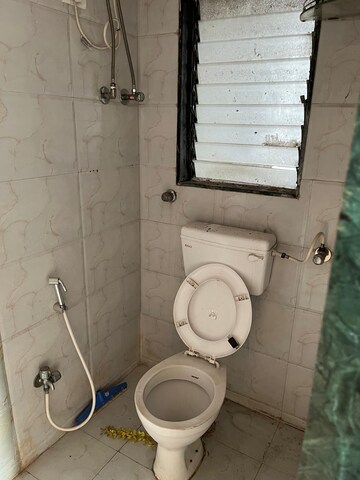 Bathroom in 2 BHK Apartment at Siddharth Palace, Malad West – for Rent