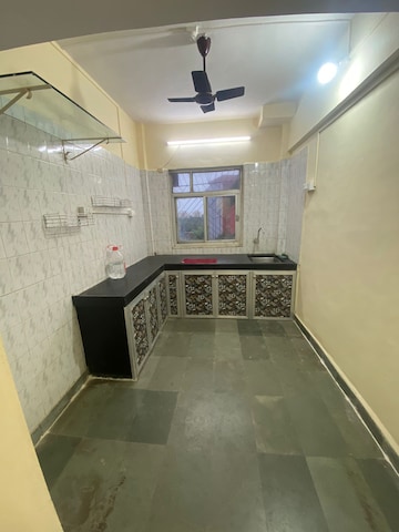 Kitchen in 1 BHK Apartment at Asmita Jyoti CHS, Malad West – for Rent