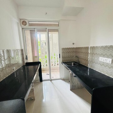 Kitchen in 2.5 BHK Apartment at Lodha Codename Premier, Mangaon – for Rent