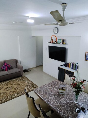 Living Room in 2 BHK Apartment at Kamanwala Manavsthal, Malad West – for Rent