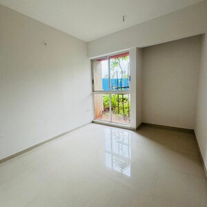 Room in 2.5 BHK Apartment at Lodha Codename Premier, Mangaon – for Sale