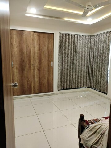 Bedroom in 3 BHK Apartment at 150 Feet Ring Road – for Sale