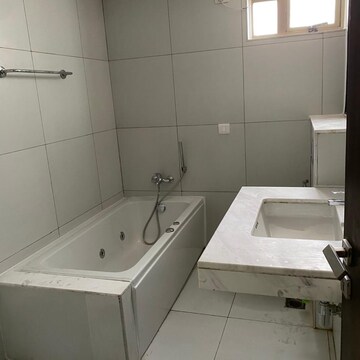 Bathroom in 4 BHK Apartment at Tata Primanti-Executive Apartments, Dhani – for Rent