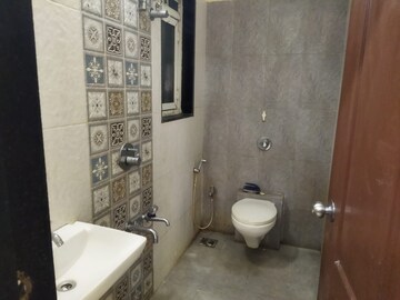 Bathroom in 1 BHK Apartment at Cosmos Enclave, Kasarvadavali – for Rent