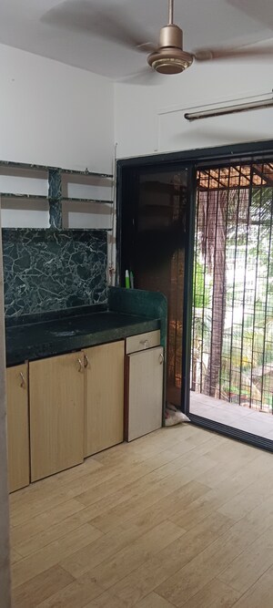 Kitchen in 1 BHK Apartment at Sai Niketan CHS Goregaon, Goregaon East – for Sale