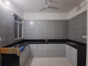 Kitchen in 2 BHK Apartment at Rama Fusion Towers, Hinjewadi – for Rent