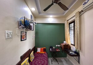 Living Room in 2.5 BHK Apartment at Om Madhuban CHS, Hans Nagar – for Sale
