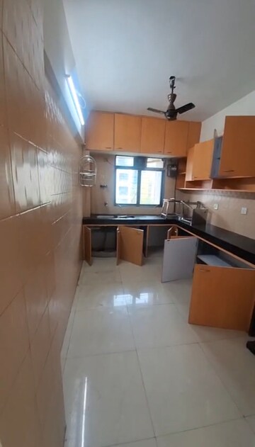 Kitchen in 2 BHK Apartment at OM Elegance, Malad West – for Rent
