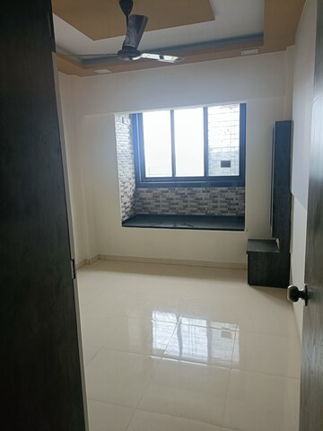 Room in 2 BHK Apartment at Bhanushanti Complex, Malad East – for Rent