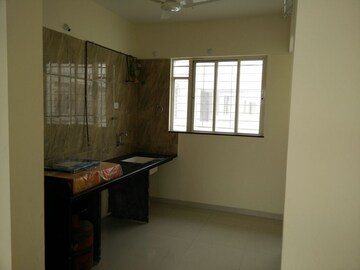Kitchen in 2 BHK Apartment at Sharmad Residency, Karve Road – for Sale