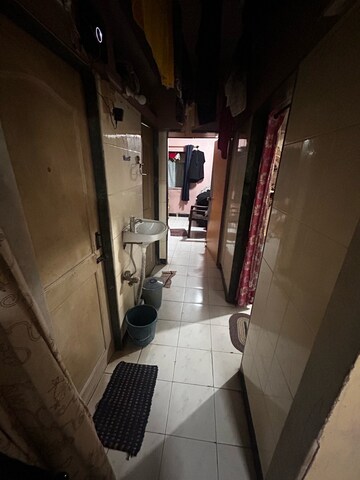 Corridor in 1 BHK Apartment at Vinay Sankalp CHS, Malad East – for Sale