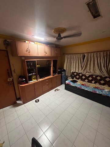 Living Room in 1 BHK Apartment at Vinay Sankalp CHS, Malad East – for Sale
