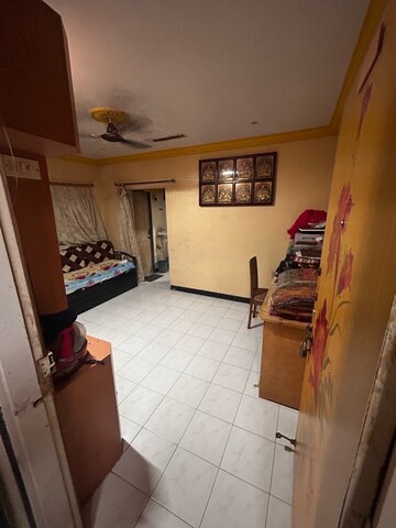Living Room in 1 BHK Apartment at Vinay Sankalp CHS, Malad East – for Sale