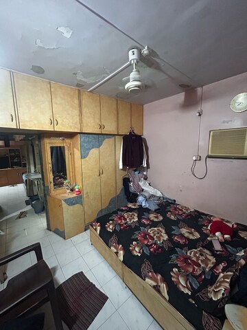 Master Bedroom in 1 BHK Apartment at Vinay Sankalp CHS, Malad East – for Sale