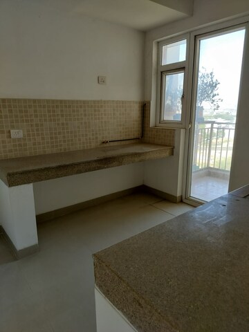 Kitchen in 3 BHK Apartment at Emaar Gurgaon Greens, Sector 102 – for Sale