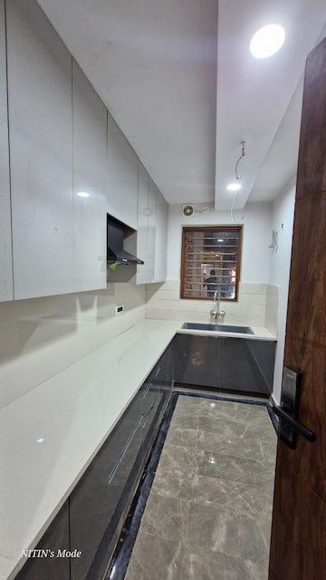 Kitchen in 3 BHK Builder Floor at Green Fields Colony – for Sale