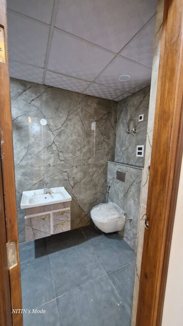 Bathroom in 3 BHK Builder Floor at Green Fields Colony – for Sale