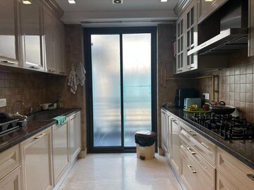 Kitchen in 4 BHK Apartment at Vasant Vihar – for Rent
