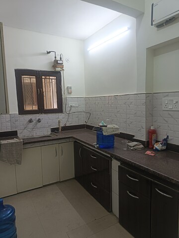 Kitchen in 2 BHK Apartment at Arun Vihar Sector 37, Sector 37 – for Rent