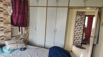 Bedroom in 1 BHK Apartment at Gundecha Valley of Flowers, Kandivali East – for Rent