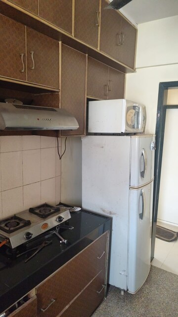 Kitchen in 1 BHK Apartment at Gundecha Valley of Flowers, Kandivali East – for Rent