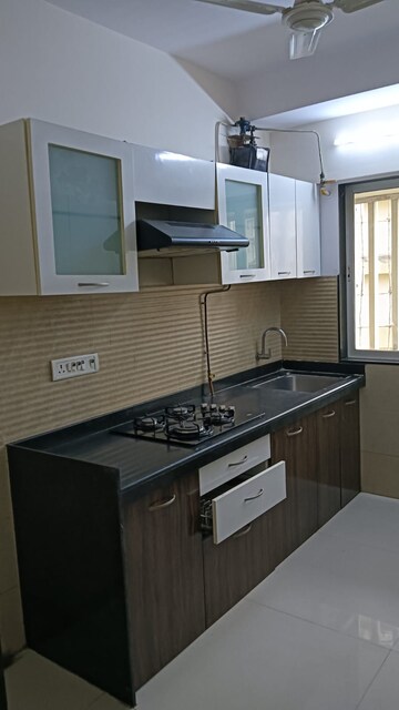 Kitchen in 1 BHK Apartment at Gemstar BlueBerry, Malad West – for Rent
