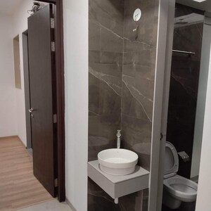 Bathroom in 3 BHK Apartment at Anmol Tower, Mahesh Nagar – for Sale