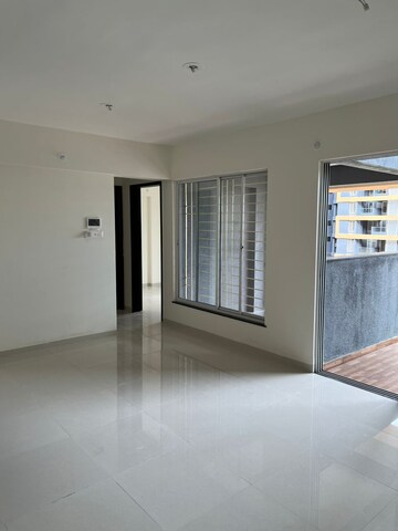Room in 2 BHK Apartment at Gini Belvista Phase 1, Dhanori – for Rent