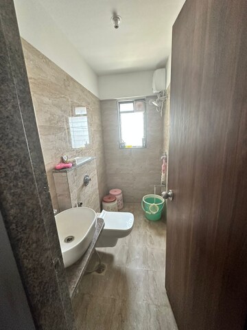 Bathroom in 3 BHK Apartment at Parinee Essence, Kandivali West – for Rent