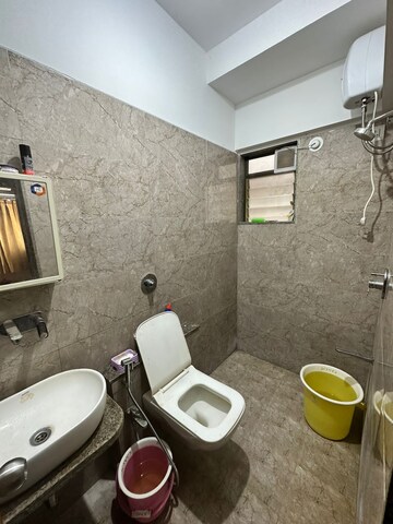 Bathroom in 3 BHK Apartment at Parinee Essence, Kandivali West – for Rent