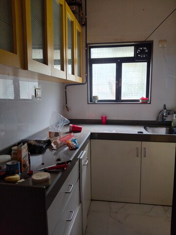 Kitchen in 2 BHK Apartment at Oshiwara Mhada, Andheri West – for Rent