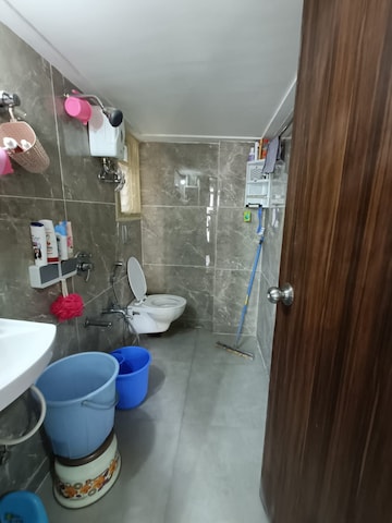 Bathroom in 1 BHK Apartment at RNA NG Ocean Pearl, Mira Road – for Rent