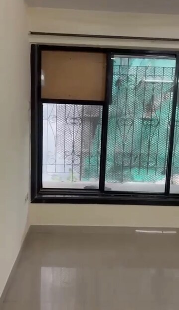 Room in 2 BHK Apartment at Shree Vallabh Tower, Malad West – for Rent