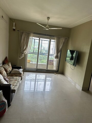 Living Room in 2 BHK Apartment at Adhiraj Gardens, Kharghar – for Rent