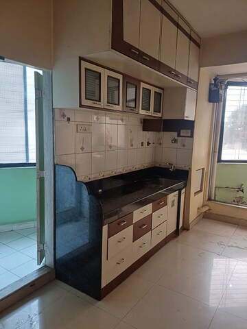 Kitchen in 3 BHK Apartment at Vasundhara Co Op Hsg Society, Kharghar – for Rent