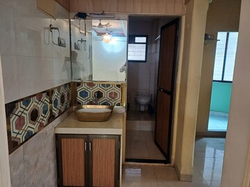 Bathroom in 3 BHK Apartment at Vasundhara Co Op Hsg Society, Kharghar – for Rent